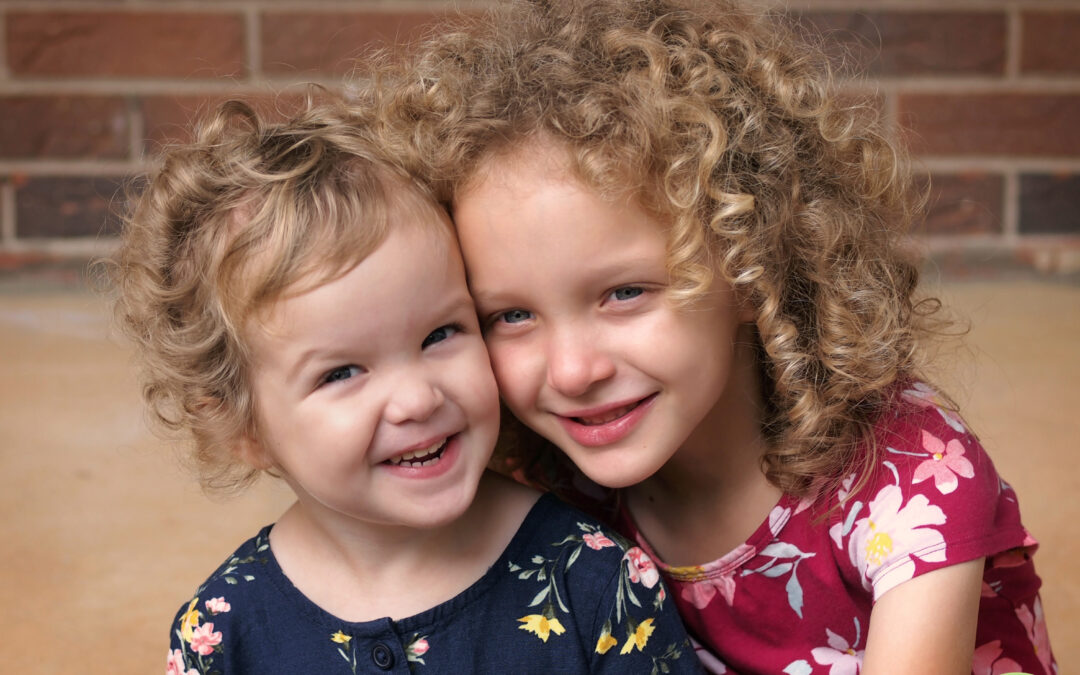 Fun Outdoor Portraits of Sweet Sisters